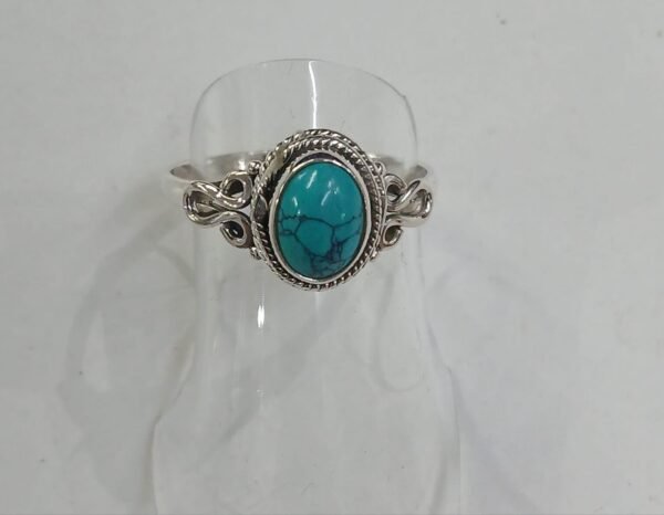 anillo con piedra turquesa. talla 17. plata de Ley