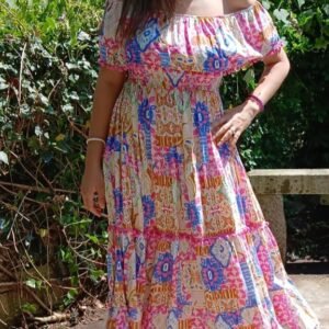Vestido floral con volante y pompones